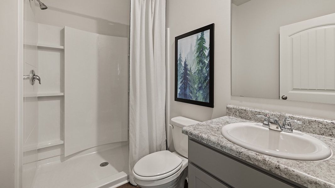 Representative furnished interior of a home built from the ROBIE by D.R. Horton in Pointe Park, Union City (Image 19).
