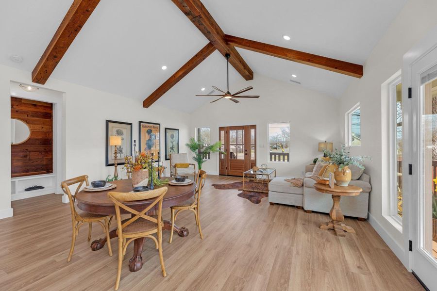 Dining room featuring luxury vinyl wood-type flooring, recessed lighting.