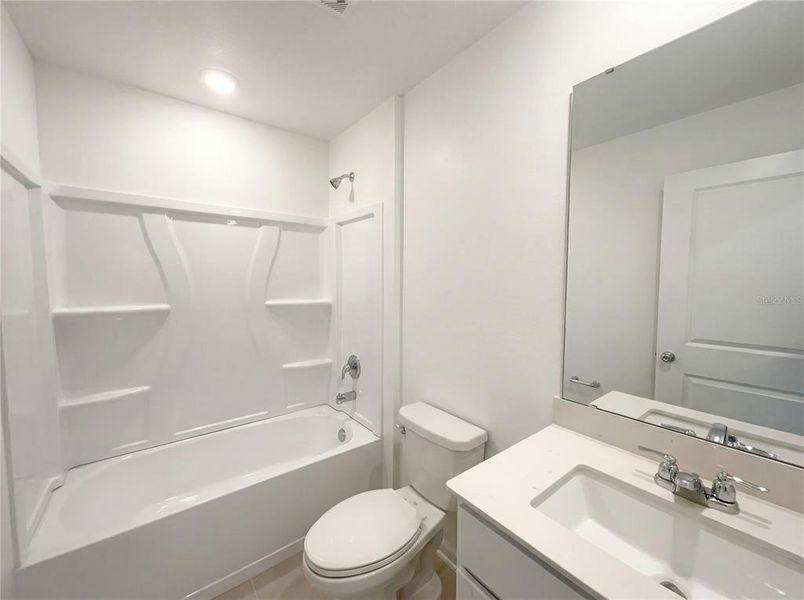 Furnished interior view inside a new home in Peace Creek Reserve, Winter Haven (Image 8).