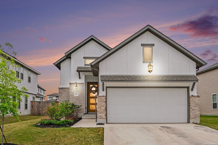 Front exterior of a new home in The Parklands, Schertz, TX, highlighting curb appeal (Image 22).