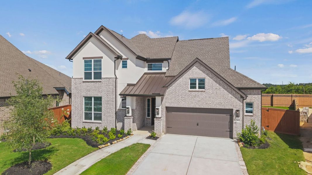 Representative exterior photo of a completed home built from the Rivers by Chesmar Homes in Sofi Lakes, Katy, TX (Image 25).