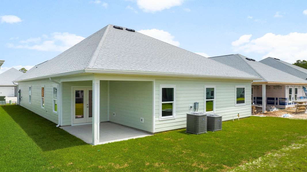 Exterior details and patio area of a home in WindMark Beach, Port Saint Joe (Image 3).