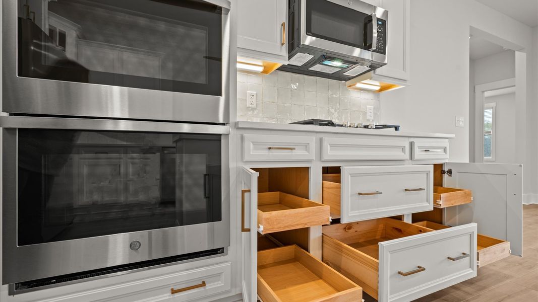 Accomplished layout with a first-class kitchen in this select community by DRB Homes Accomplished layout with a first-class kitchen in this select community by DRB Homes