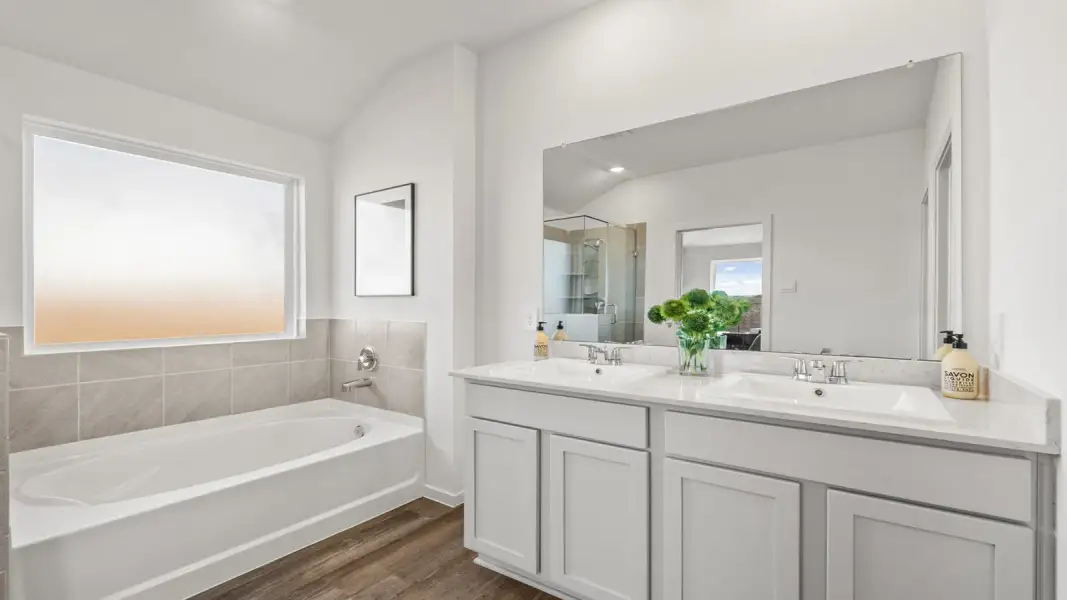 Furnished interior view inside a new home in Sunterra Lakes, Brookshire (Image 33).
