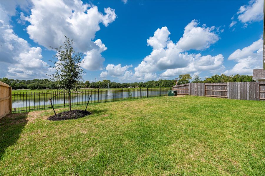 Front exterior of a new home in , Santa Fe, TX, highlighting curb appeal (Image 21).