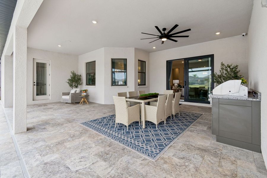 Exterior details and patio area of a home in River Preserve Estates, Parrish (Image 38).