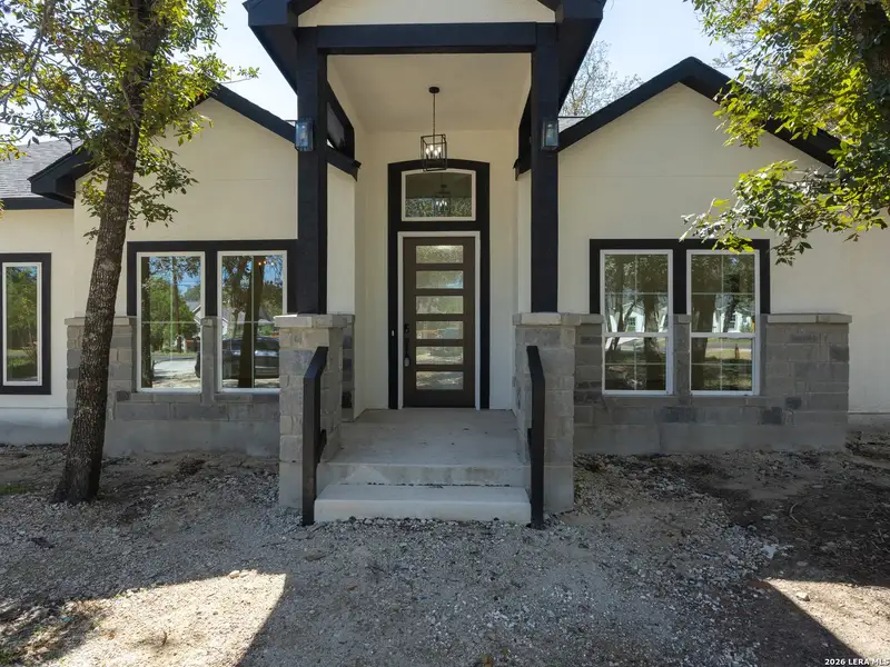 Exterior details and patio area of a home in , Elmendorf (Image 4).