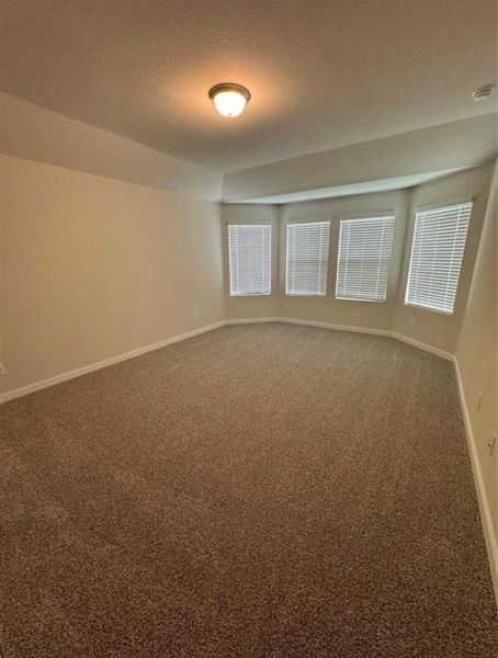 Spacious, unfurnished interior of a new home in Wall Street Village, Richmond (Image 13).