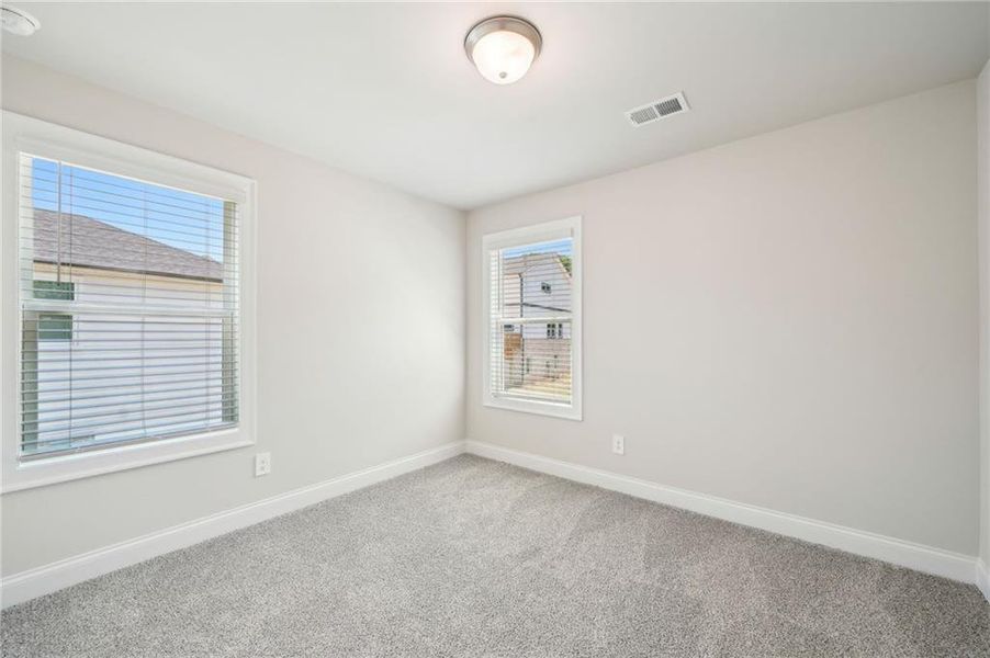 Spacious, unfurnished interior of a new home in Hemingway - Cottage Series, Cumming (Image 21). Spacious, unfurnished interior of a new home in Hemingway - Cottage Series, Cumming (Image 21).