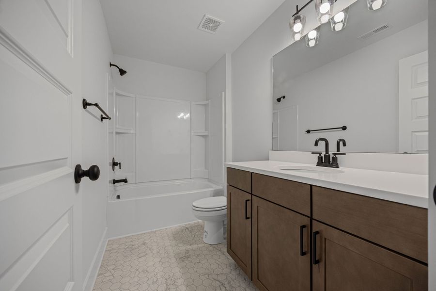 Representative furnished interior of a home built from the Gayle Townhome by Parkside Builders in The Parks of Mill Town, Chattanooga (Image 20).
