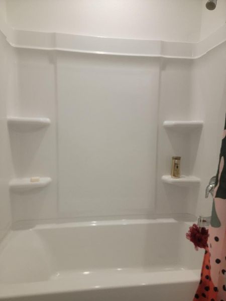Guest bathroom with large tub shower. Guest bathroom with large tub shower.