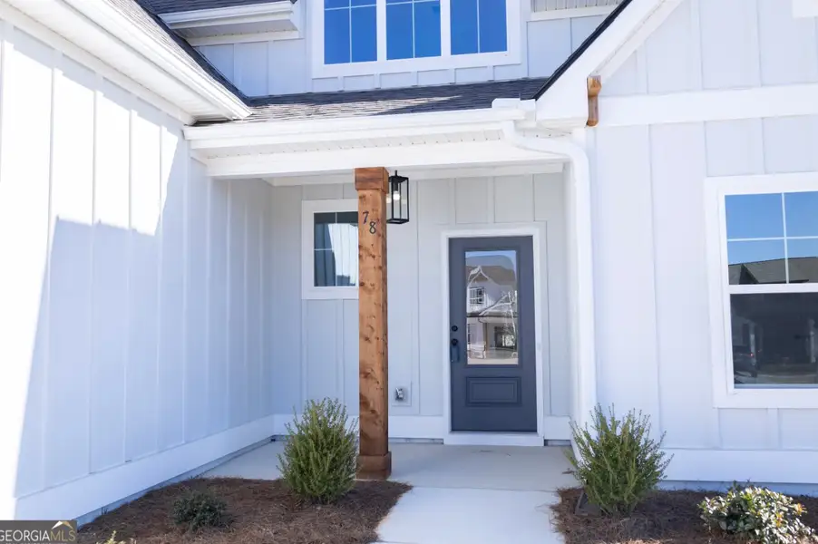 Exterior details and patio area of a home in Twelve Parks, Sharpsburg (Image 3).