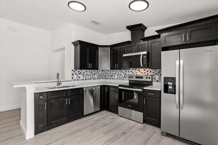 Furnished interior view inside a new home in , Leesburg (Image 5).