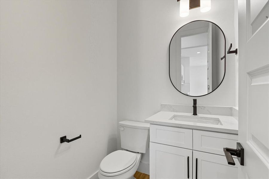 Bathroom with vanity and toilet