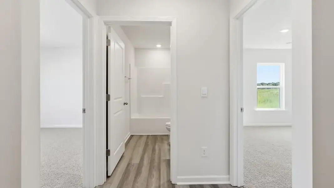Spacious, unfurnished interior of a new home in Waverly Station, Greenwood (Image 18).