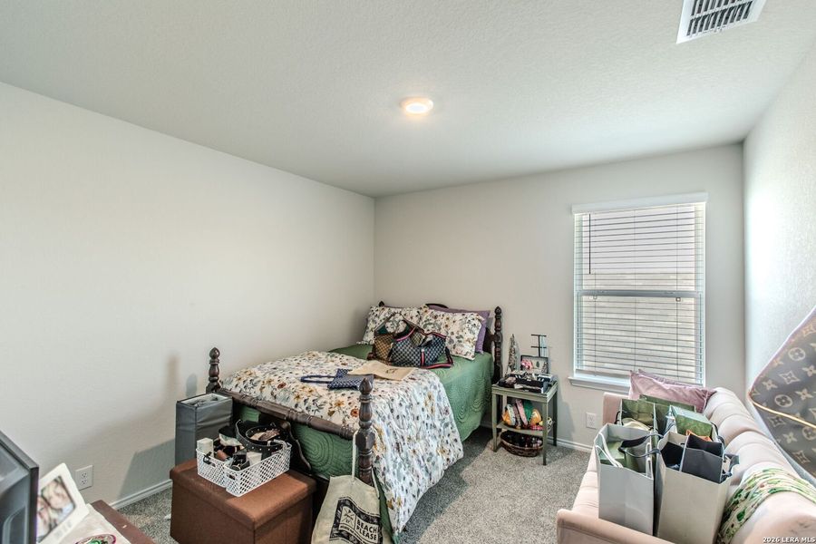 Furnished interior view inside a new home in The Links at River Bend, Floresville (Image 11).