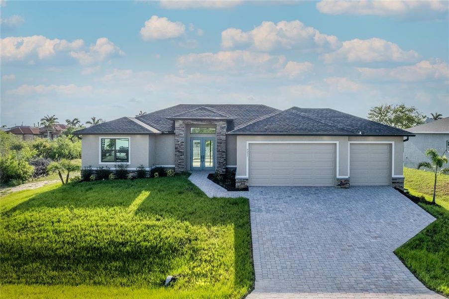 Front exterior of a new home in , Port Charlotte, FL, highlighting curb appeal (Image 1). Front exterior of a new home in , Port Charlotte, FL, highlighting curb appeal (Image 1).