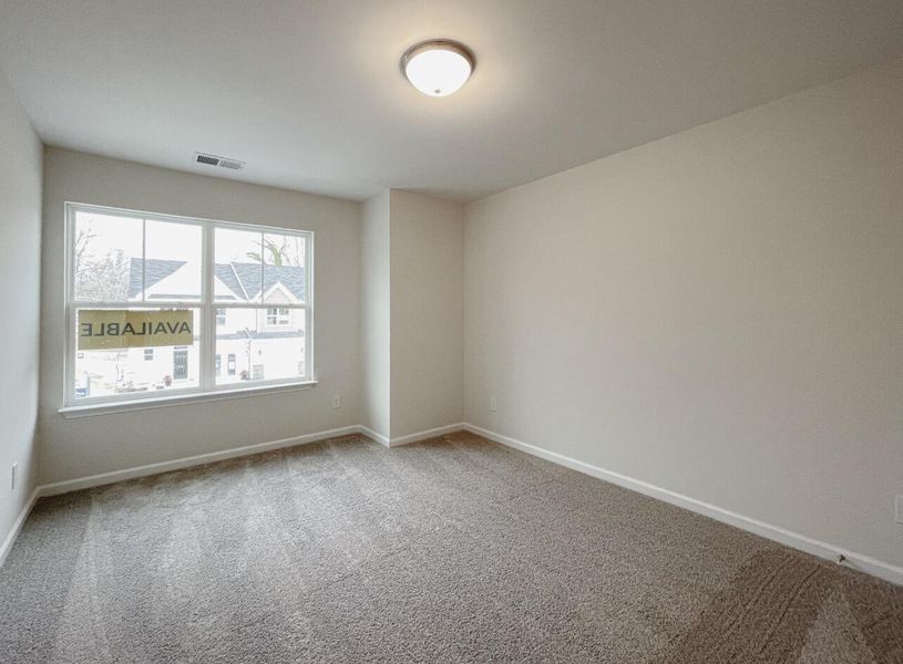 Spacious, unfurnished interior of a new home in East Main Townes, Spartanburg (Image 20).