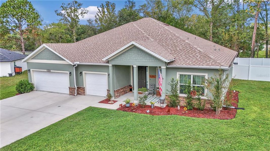 Front exterior of a new home in , Ocala, FL, highlighting curb appeal (Image 1). Front exterior of a new home in , Ocala, FL, highlighting curb appeal (Image 1).