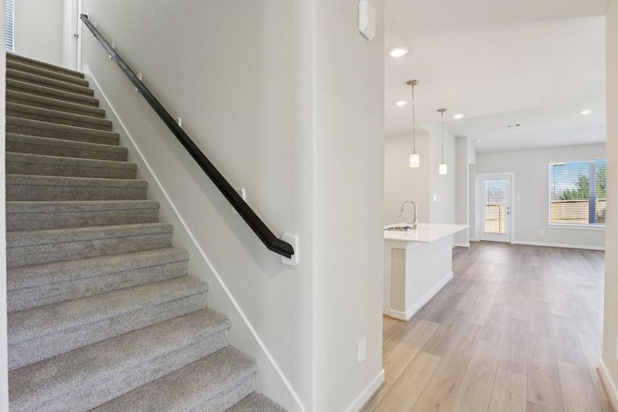Photos are not of the actual home, but are photos of the builder home with same floorplan with similar interior finishes.