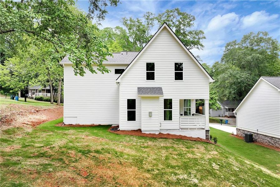 Front exterior of a new home in , Commerce, GA, highlighting curb appeal (Image 22).
