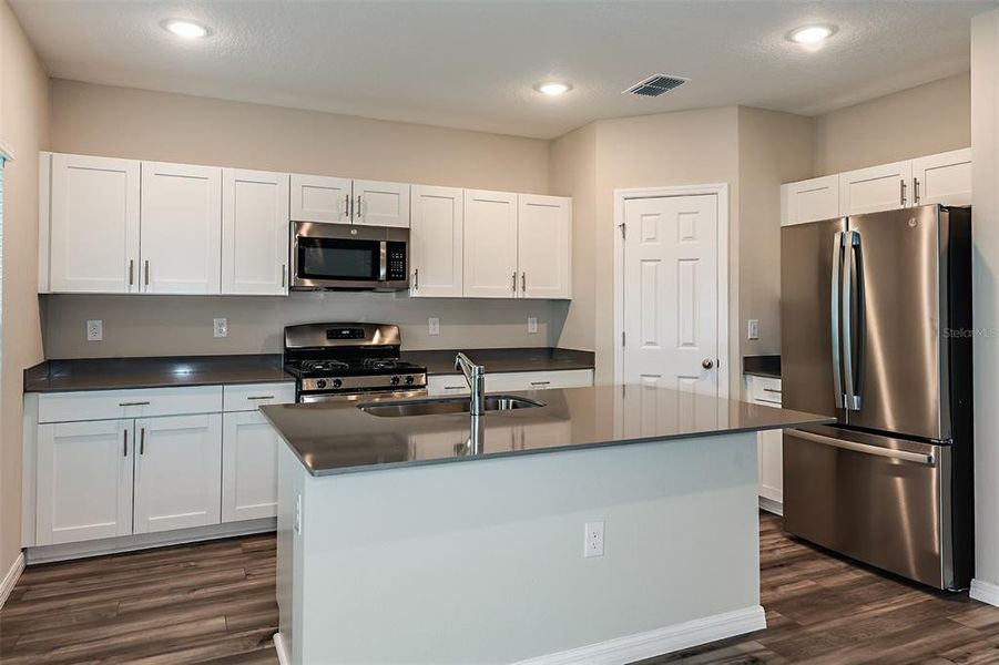 Furnished interior view inside a new home in Lawson Dunes, Haines City (Image 5). Furnished interior view inside a new home in Lawson Dunes, Haines City (Image 5).
