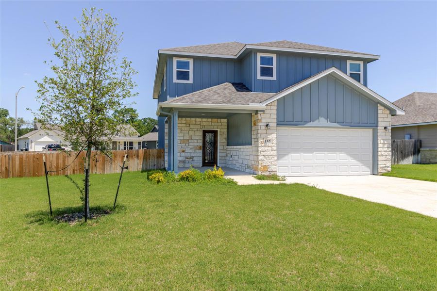 Front exterior of a new home in , Smithville, TX, highlighting curb appeal (Image 1). Front exterior of a new home in , Smithville, TX, highlighting curb appeal (Image 1).