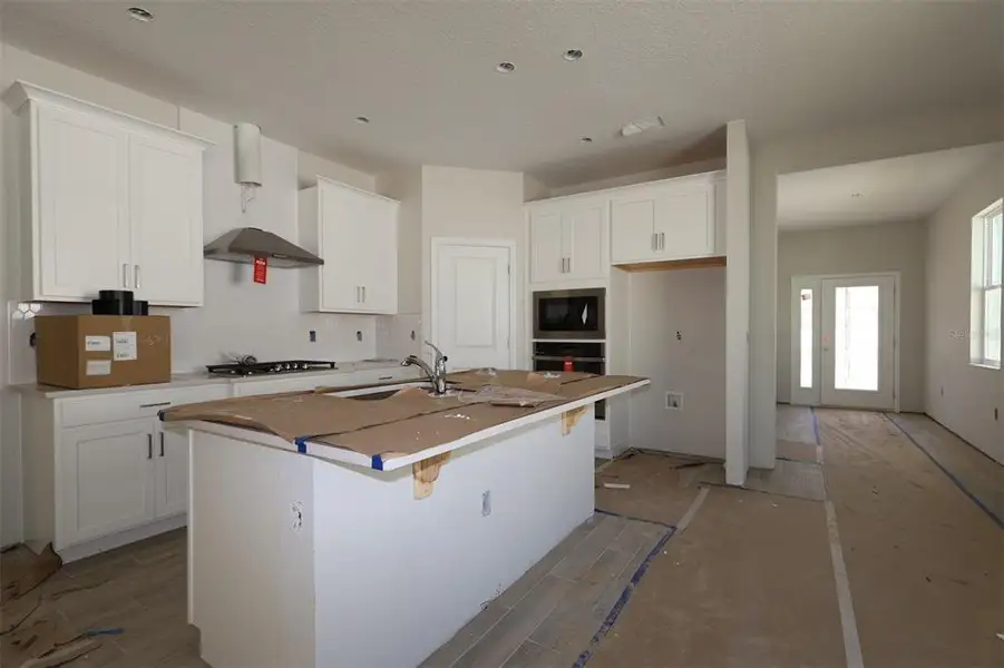 Furnished interior view inside a new home in Emerson Pointe, Apopka (Image 5).