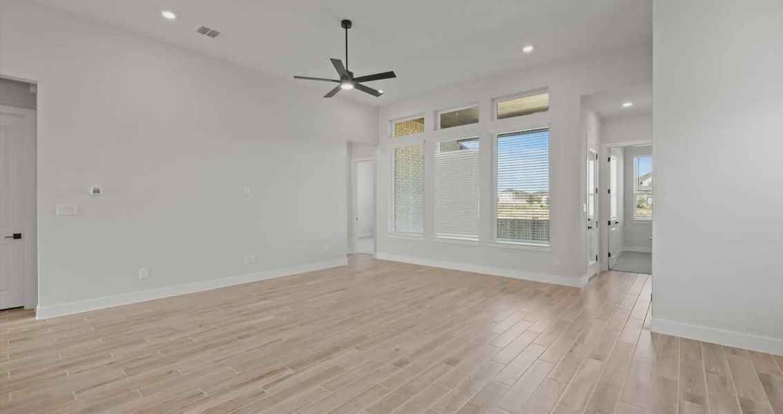 Representative unfurnished interior of a home built from the Summerton by Chesmar Homes in Village at Three Oaks, Seguin (Image 8).