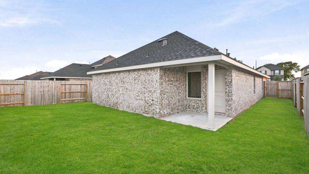 Exterior details and patio area of a home in Sunterra, Katy (Image 4).
