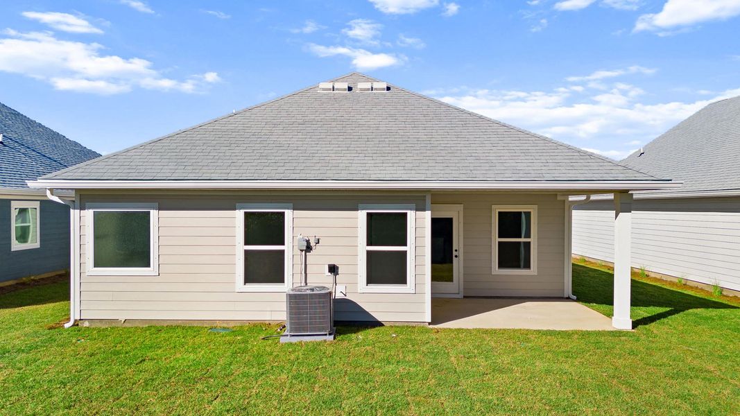 Exterior details and patio area of a home in Caballeros Estates At Hombre, Panama City Beach (Image 22).