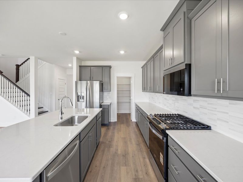 Furnished interior view inside a new home in The Coves at Lakes of Cane Bay, Summerville (Image 5).