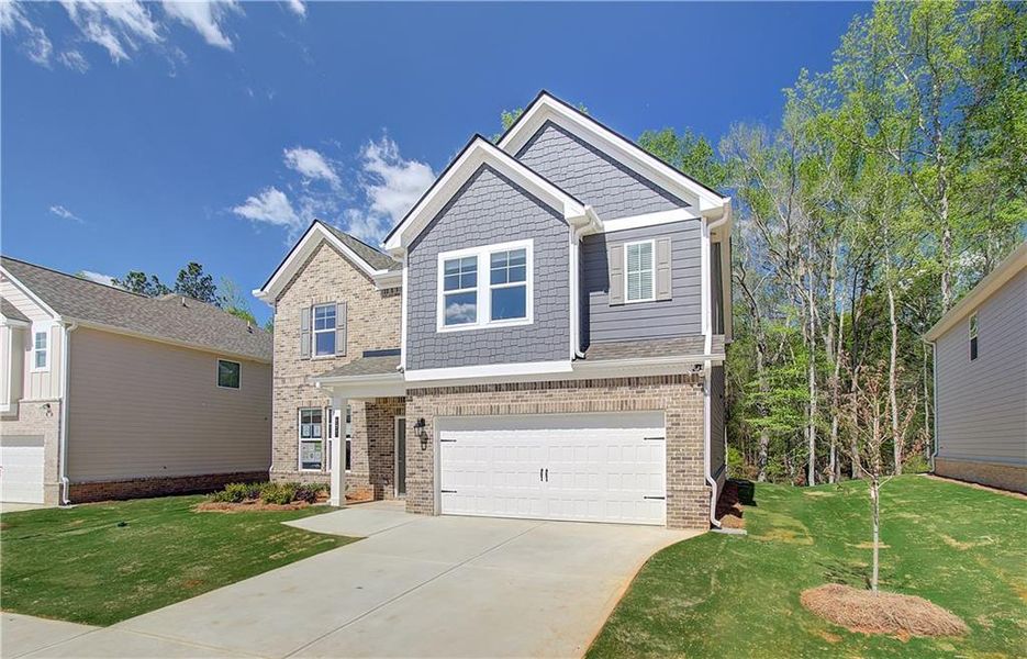 Front exterior of a new home in Westminster, Covington, GA, highlighting curb appeal (Image 17). Front exterior of a new home in Westminster, Covington, GA, highlighting curb appeal (Image 17).