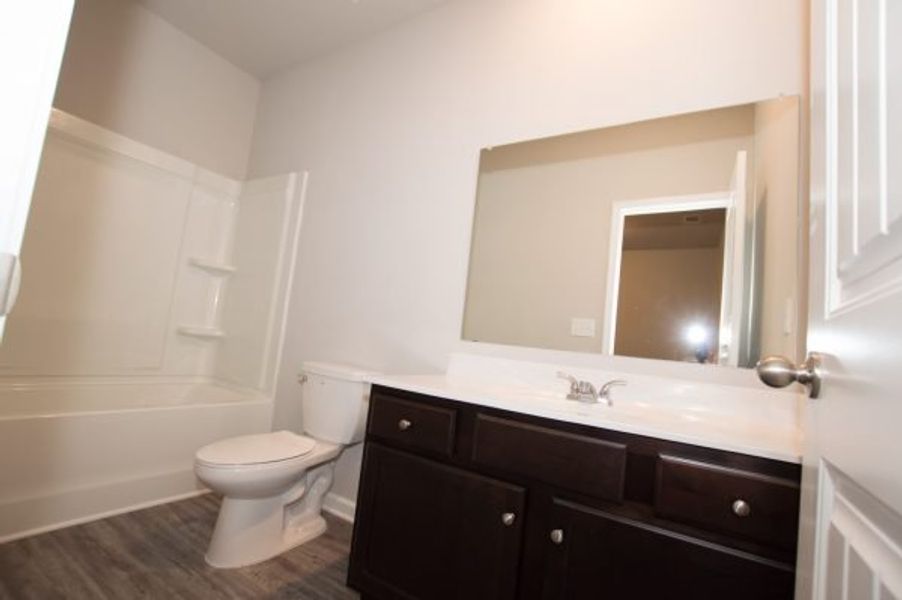 Representative furnished interior of a home built from the Cadence Unit B by Piedmont Residential in Ross Pointe, Kennesaw (Image 10).
