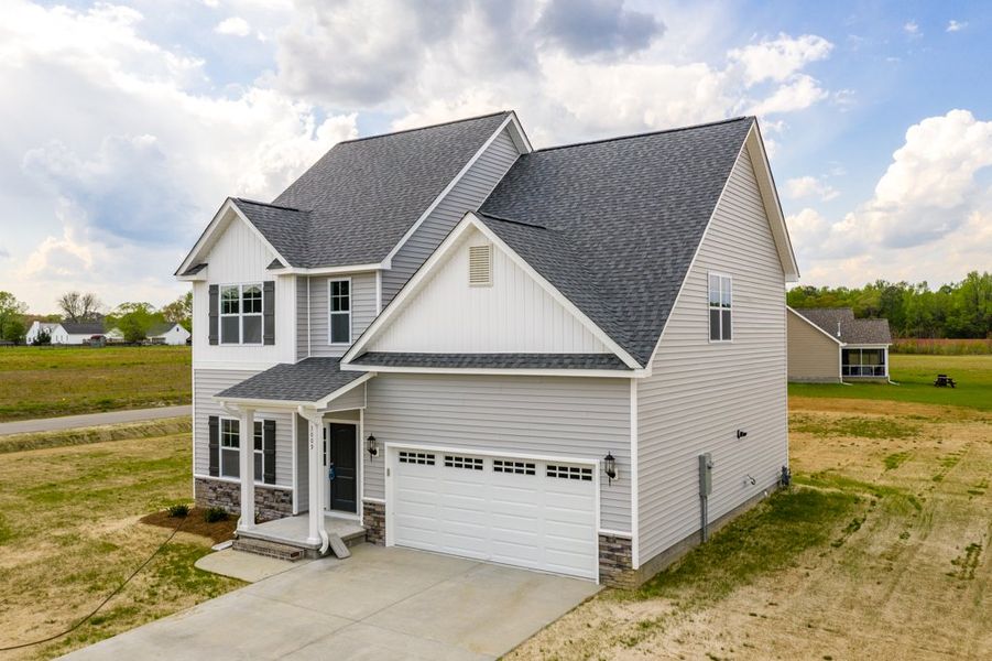 Representative exterior photo of a completed home built from the Ryder by Bill Clark Homes in Arbor Hills South II, Greenville, NC (Image 25). Representative exterior photo of a completed home built from the Ryder by Bill Clark Homes in Arbor Hills South II, Greenville, NC (Image 25).