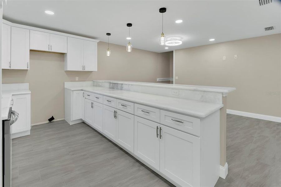 Furnished interior view inside a new home in , Daytona Beach (Image 11).