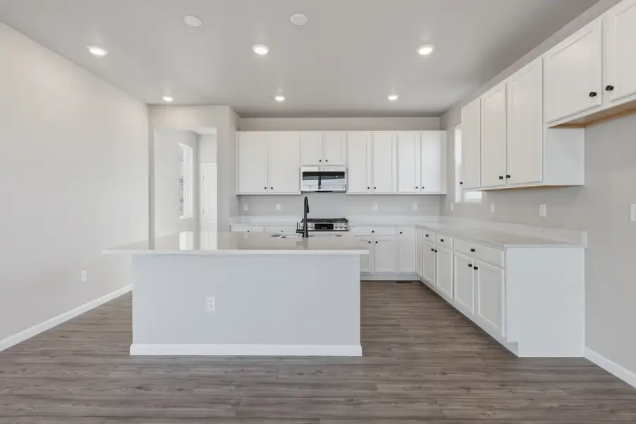Furnished interior view inside a new home in The Aurora Highlands, Aurora (Image 5).