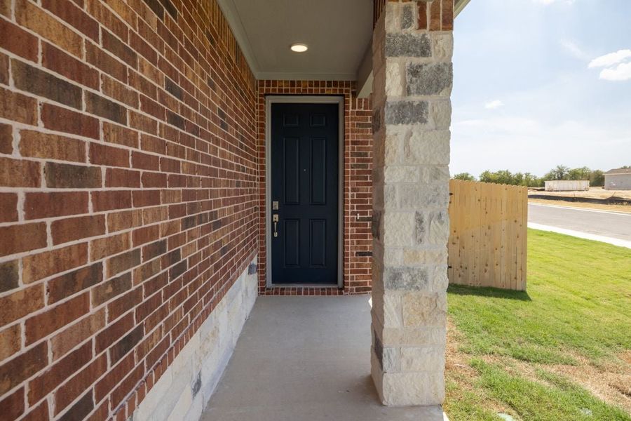 Exterior details and patio area of a home in Overlook Ranch, Georgetown (Image 3).
