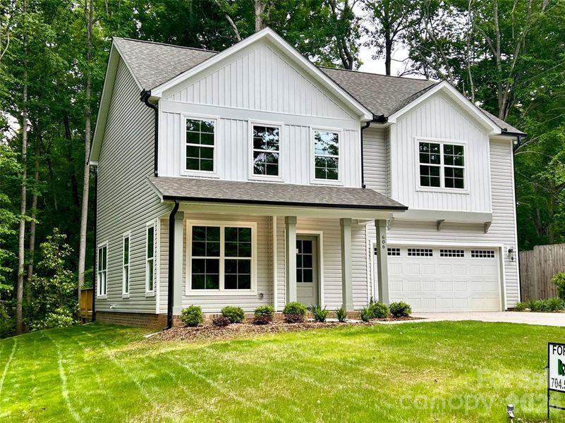 Front exterior of a new home in , Waxhaw, NC, highlighting curb appeal (Image 18).