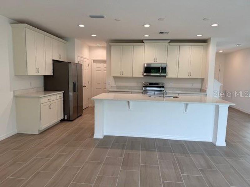 Furnished interior view inside a new home in Sky Lakes Towns, St. Cloud (Image 2).