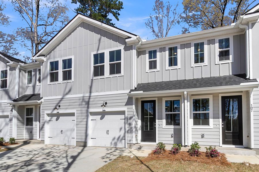 Front exterior of a new home in Windward Village, Summerville, SC, highlighting curb appeal (Image 29). Front exterior of a new home in Windward Village, Summerville, SC, highlighting curb appeal (Image 29).