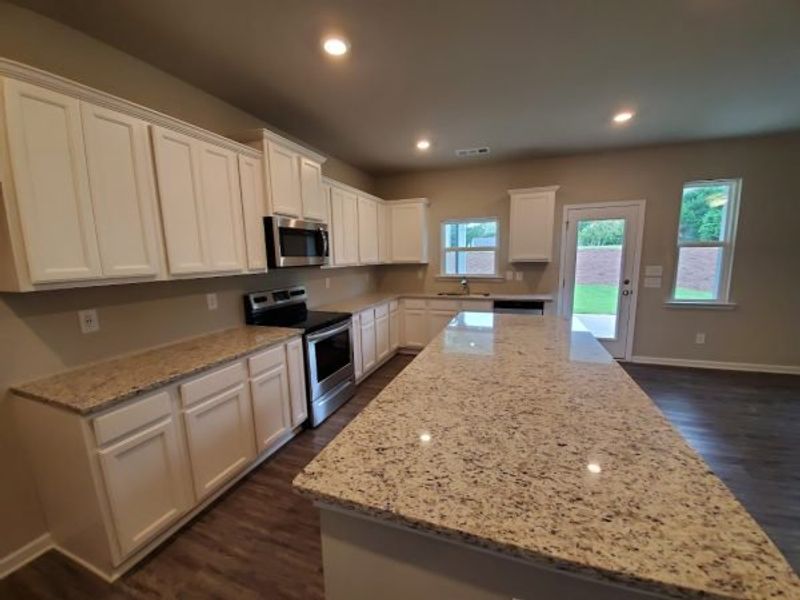 Representative furnished interior of a home built from the Springdale by Piedmont Residential in Meadowyn, Cartersville (Image 4). Representative furnished interior of a home built from the Springdale by Piedmont Residential in Meadowyn, Cartersville (Image 4).