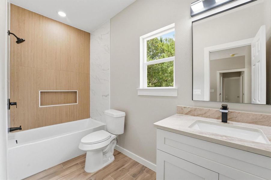 Furnished interior view inside a new home in , Conroe (Image 12).