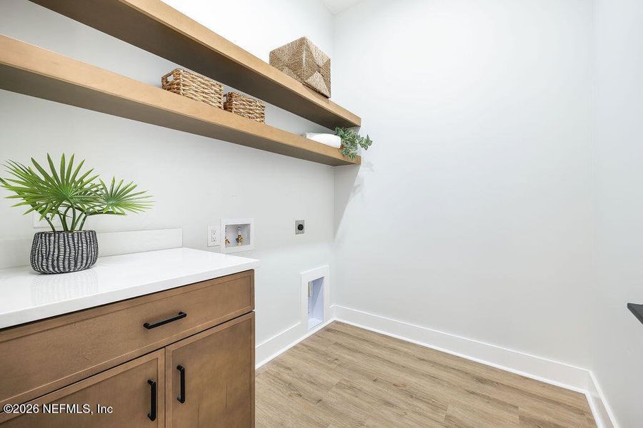 Furnished interior view inside a new home in , Jacksonville Beach (Image 5). Furnished interior view inside a new home in , Jacksonville Beach (Image 5).