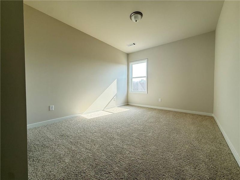 Spacious, unfurnished interior of a new home in Ponderosa Farms Manor, Gainesville (Image 29).