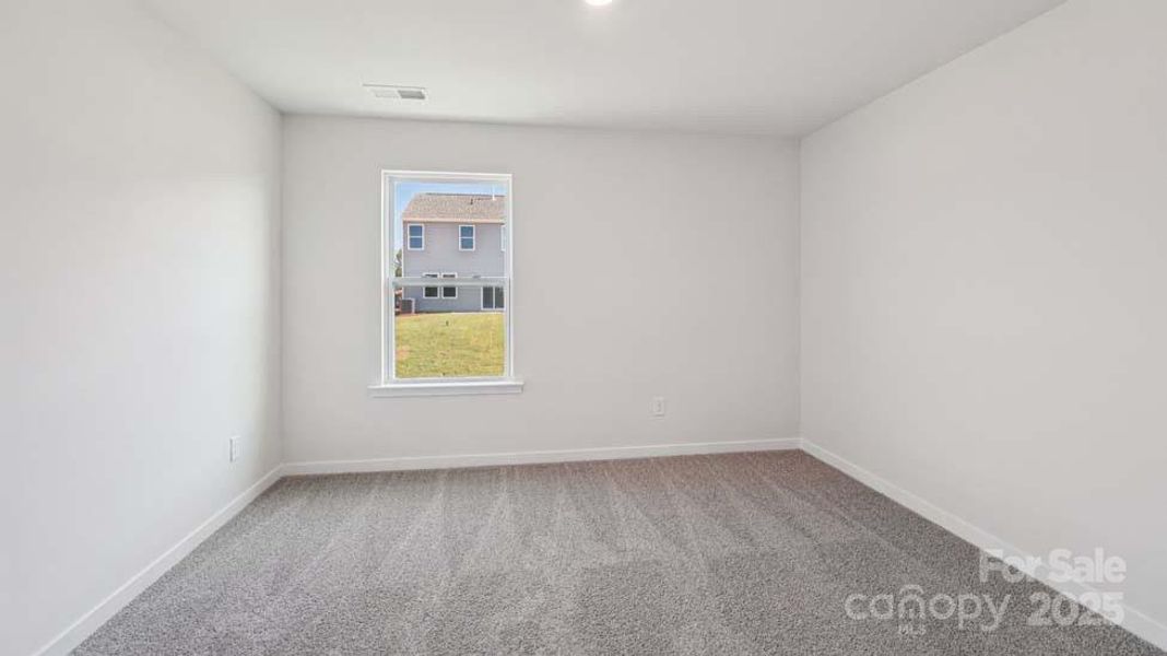 Spacious, unfurnished interior of a new home in Cardinal Creek, Charlotte (Image 16).