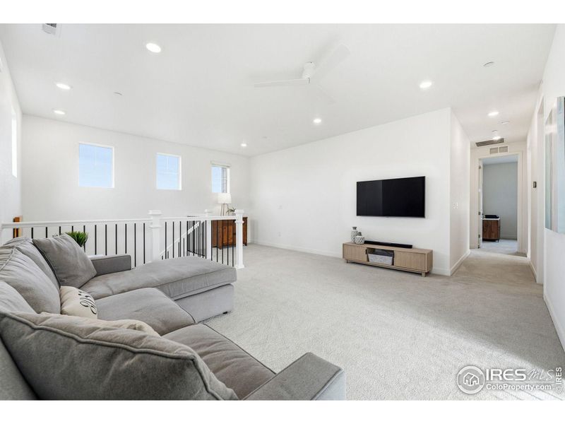 Upper-level loft space - a great spot for relaxing, media, or a flexible bonus area.