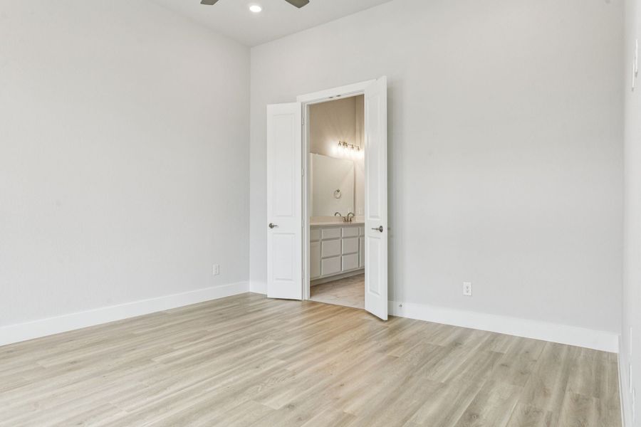 Representative unfurnished interior of a home built from the Hamilton by Centre Living Homes in Newman Village Townhomes, Frisco (Image 31).