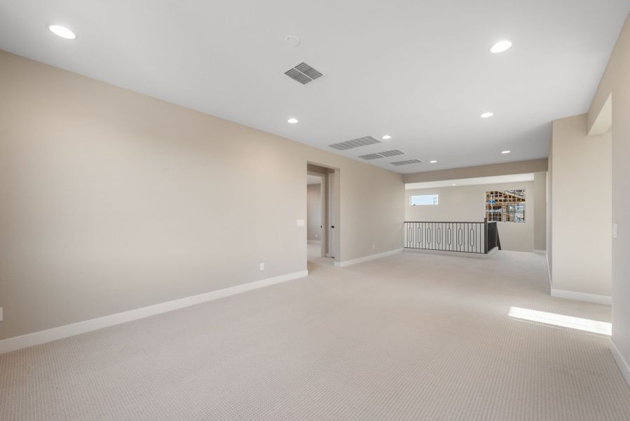 Spacious, unfurnished interior of a new home in Legado West, Queen Creek (Image 22).
