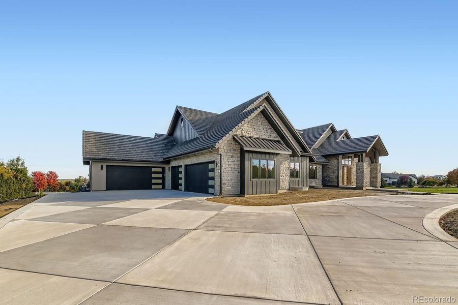 Front exterior of a new home in , Broomfield, CO, highlighting curb appeal (Image 25). Front exterior of a new home in , Broomfield, CO, highlighting curb appeal (Image 25).